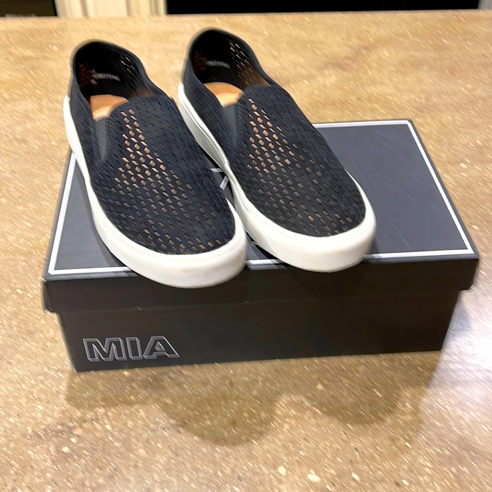 Perforated black slip on’s perfect for summer
